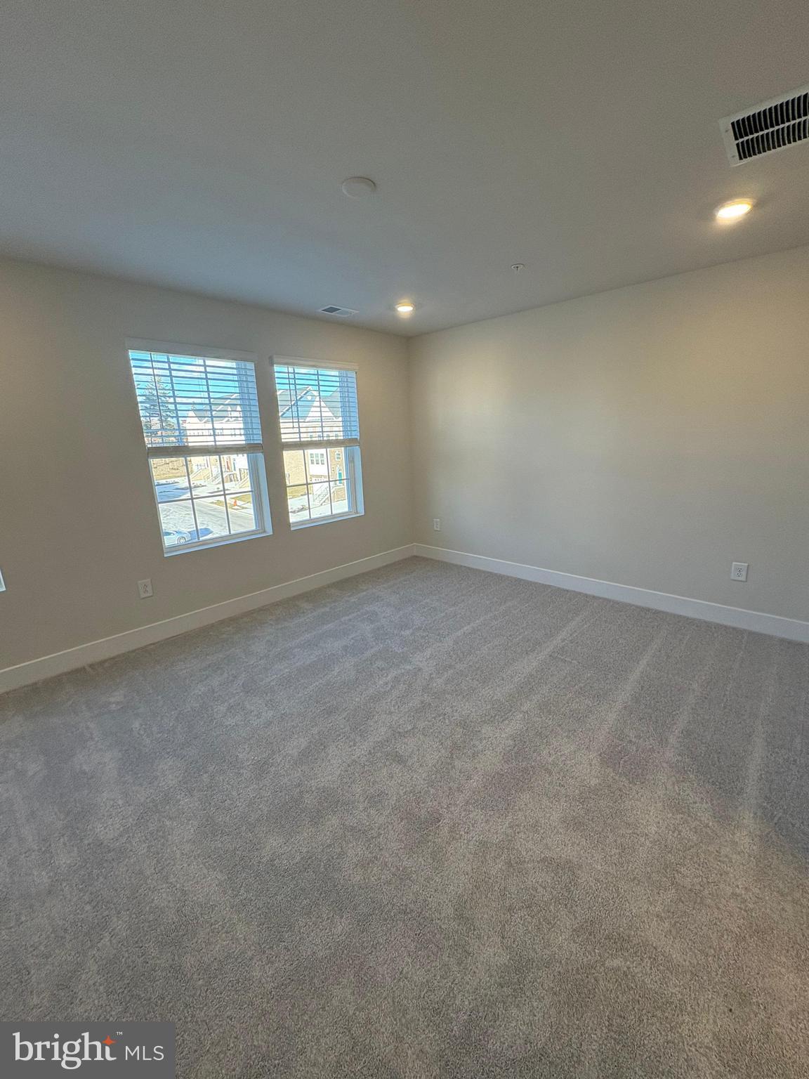 1744 Water Xing Road Baltimore, MD 21208 - Photo 11 of 12 an empty room with windows