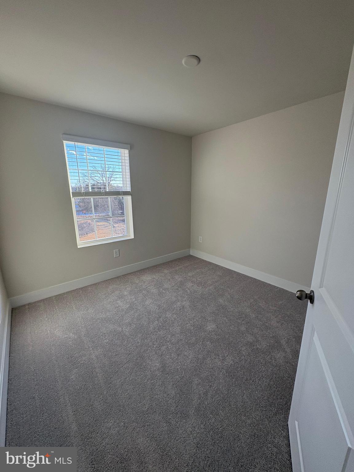 1744 Water Xing Road Baltimore, MD 21208 - Photo 6 of 12 an empty room with windows