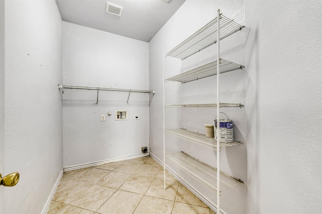 2617 Hereford Road Denton, TX 76210 - Photo 22 of 27 a view of an empty walk in closet