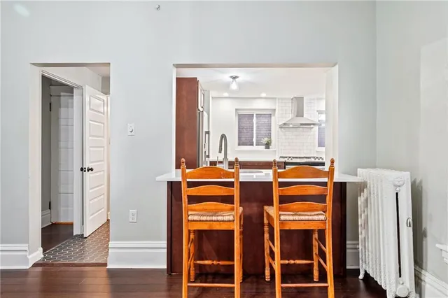 a dining table seating space and a window