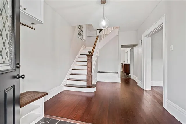 a view of entryway with wooden floor