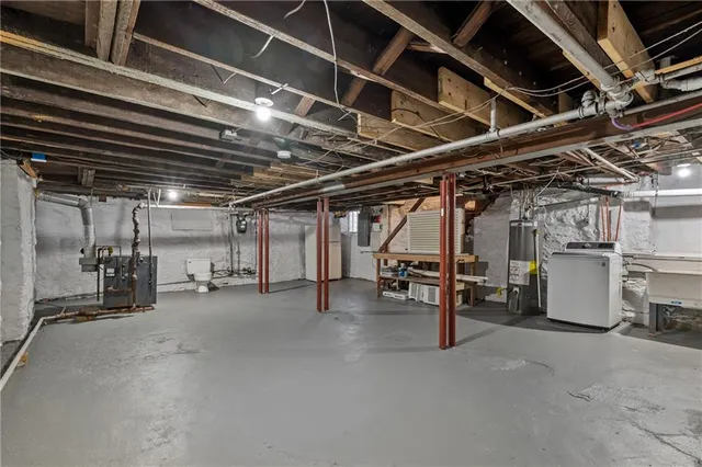 a view of living room with furniture and windows