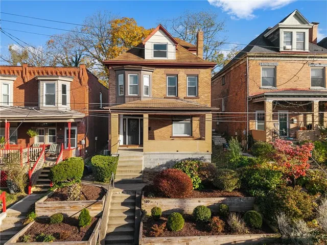 an aerial view of multiple house