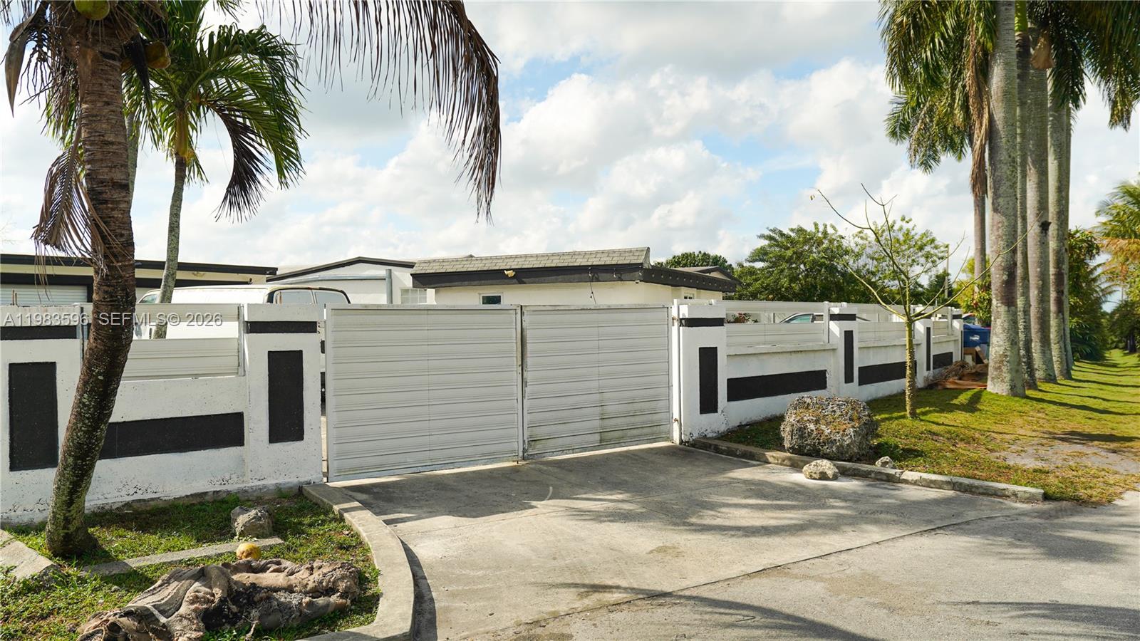 1720 Northwest 124th Terrace Miami, FL 33167 - Photo 2 of 73 a view of a backyard