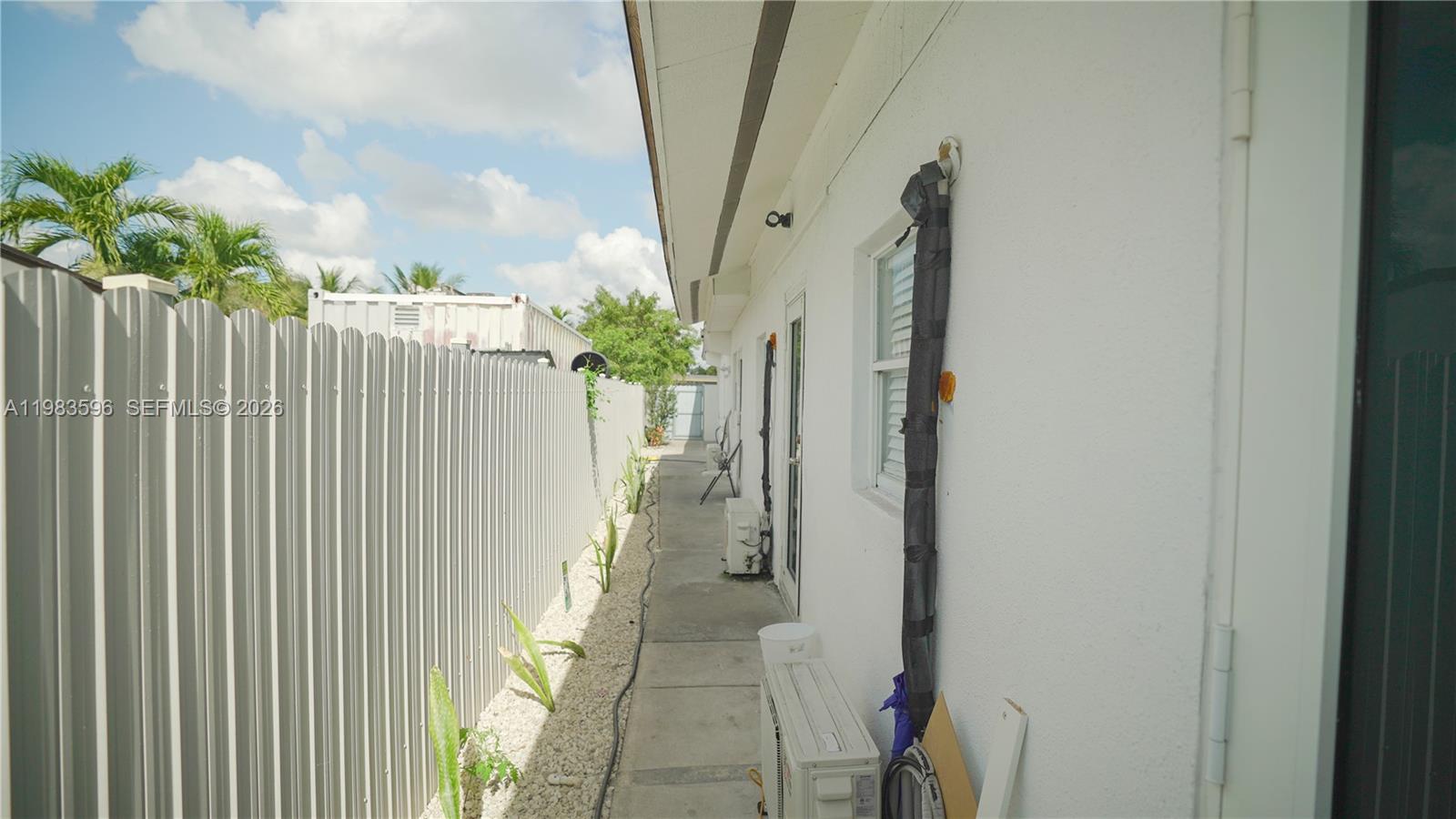 1720 Northwest 124th Terrace Miami, FL 33167 - Photo 25 of 73 a view of a pathway of a house