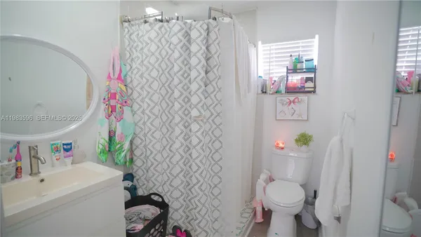 a bedroom with a bed and a cabinets
