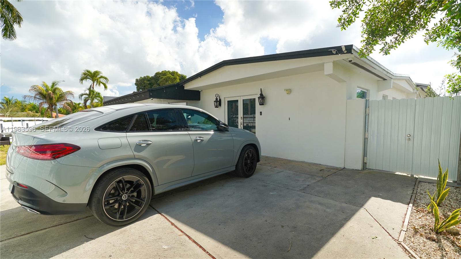 1720 Northwest 124th Terrace Miami, FL 33167 - Photo 5 of 73 a view of a car garage