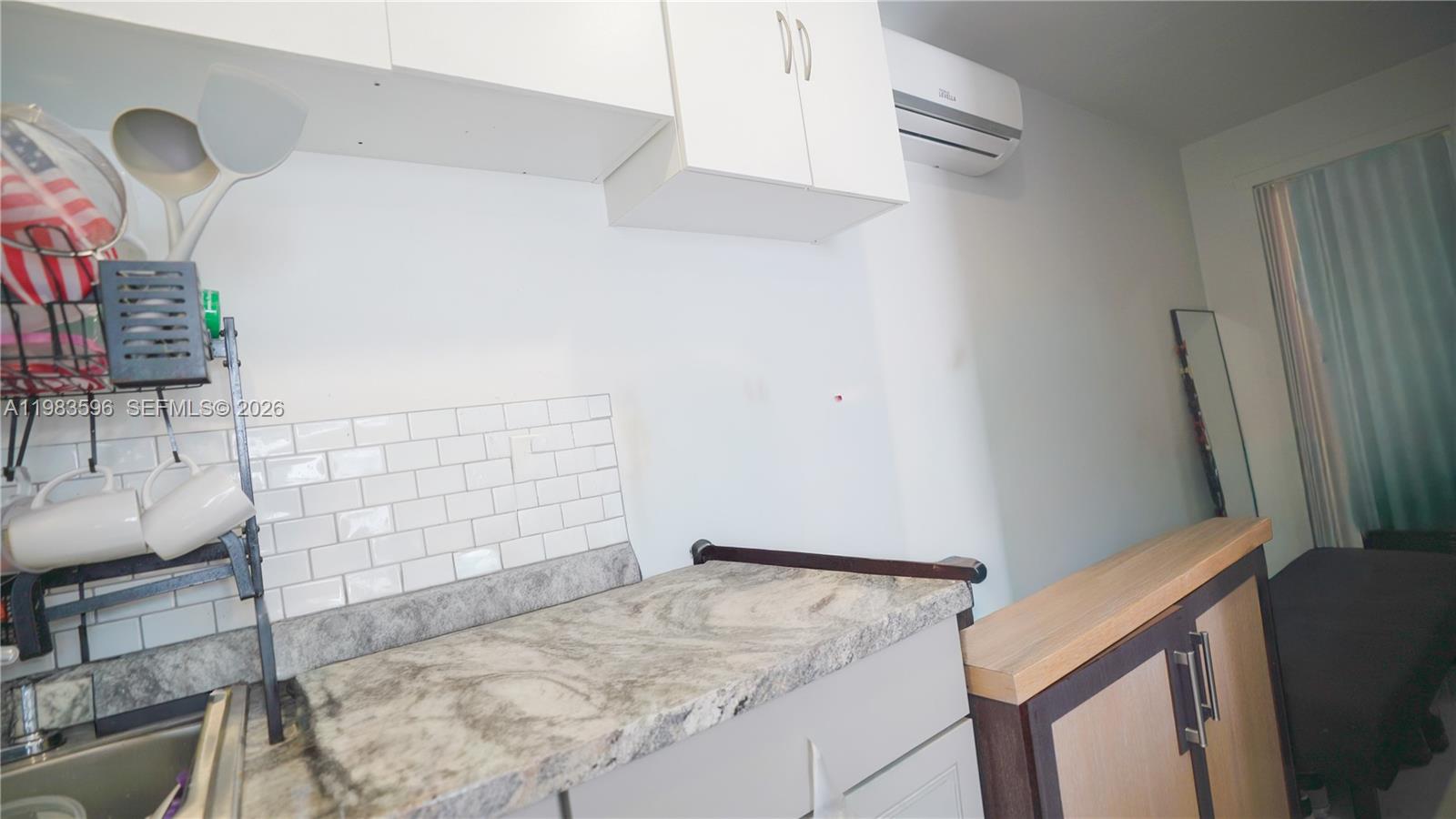 1720 Northwest 124th Terrace Miami, FL 33167 - Photo 52 of 73 a view of storage and utility room