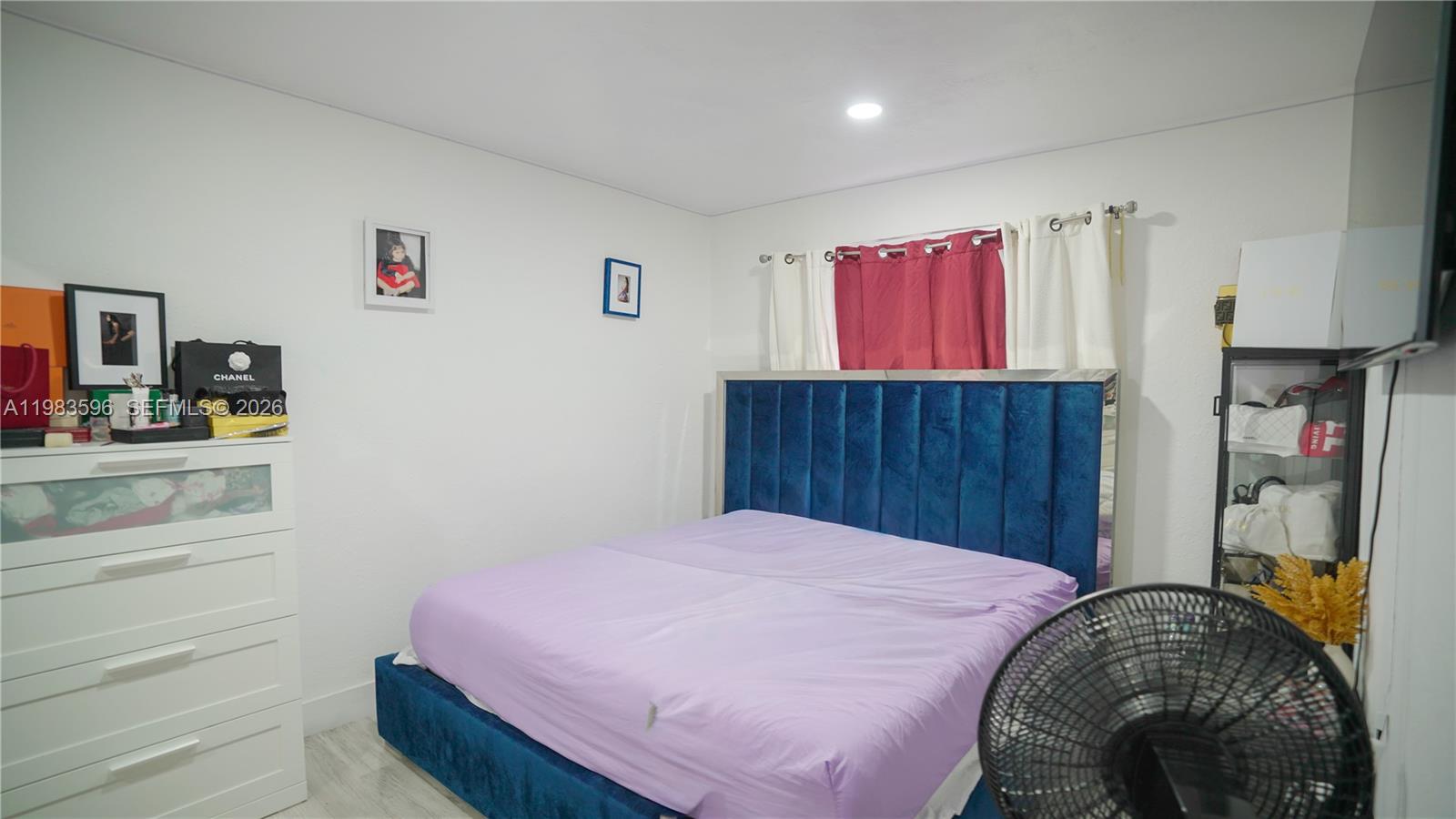 1720 Northwest 124th Terrace Miami, FL 33167 - Photo 72 of 73 a bedroom with a bed and a closet