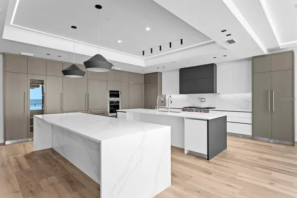 a kitchen with a stove and a microwave