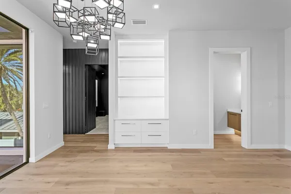 a view of an empty room and window