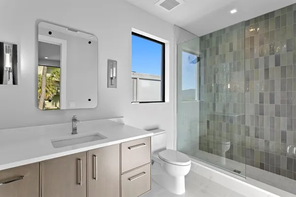 a bathroom with a sink and a toilet