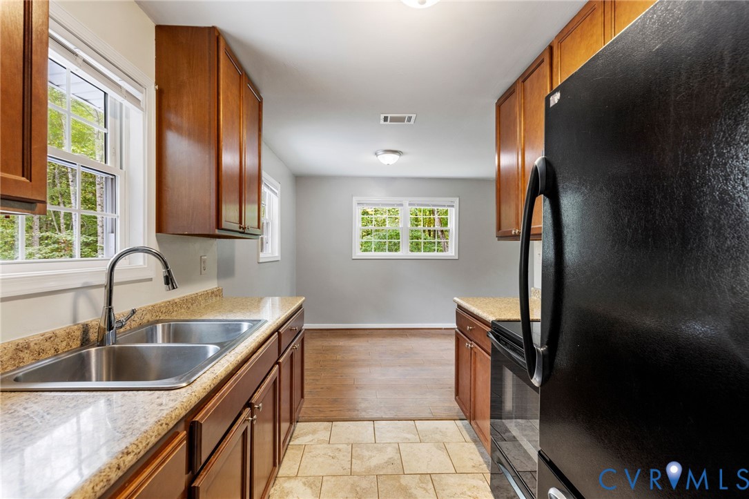 164 Kinneytown Road Mineral, VA 23117 - Photo 13 of 31 a kitchen with granite countertop a sink and a window