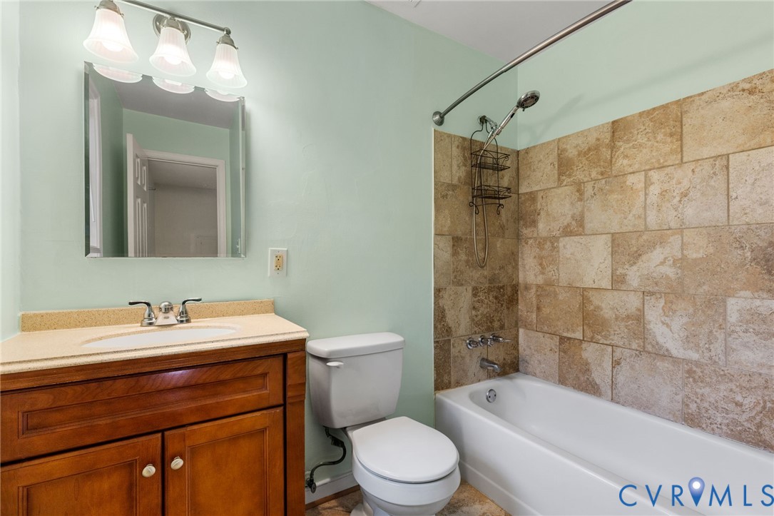 164 Kinneytown Road Mineral, VA 23117 - Photo 23 of 31 a bathroom with a sink a toilet and shower