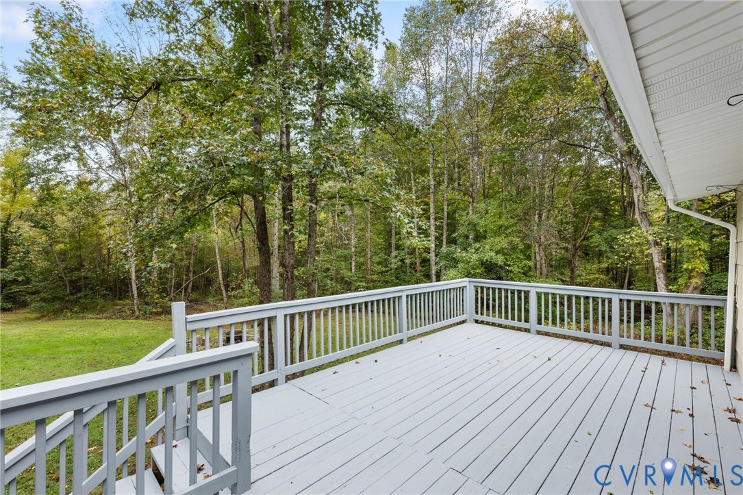 164 Kinneytown Road Mineral, VA 23117 - Photo 24 of 31 a view of backyard with deck and trees