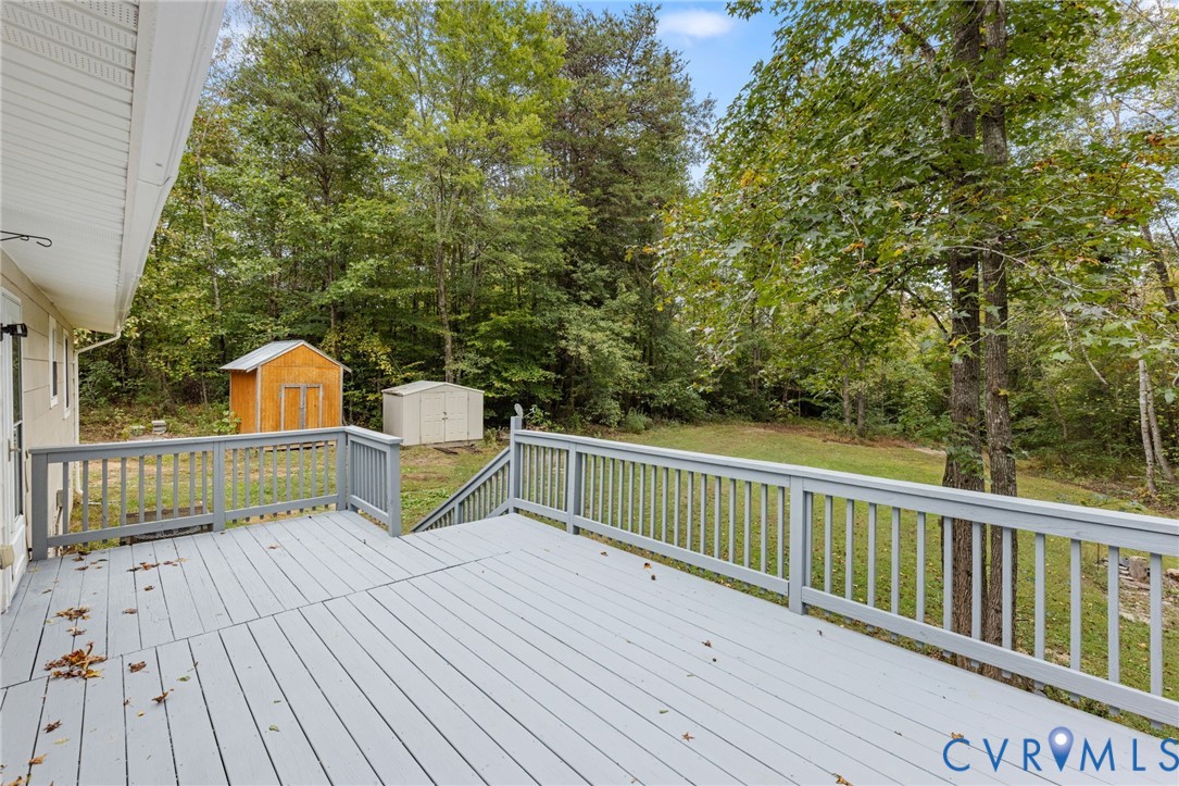 164 Kinneytown Road Mineral, VA 23117 - Photo 25 of 31 a view of a wooden deck with a yard