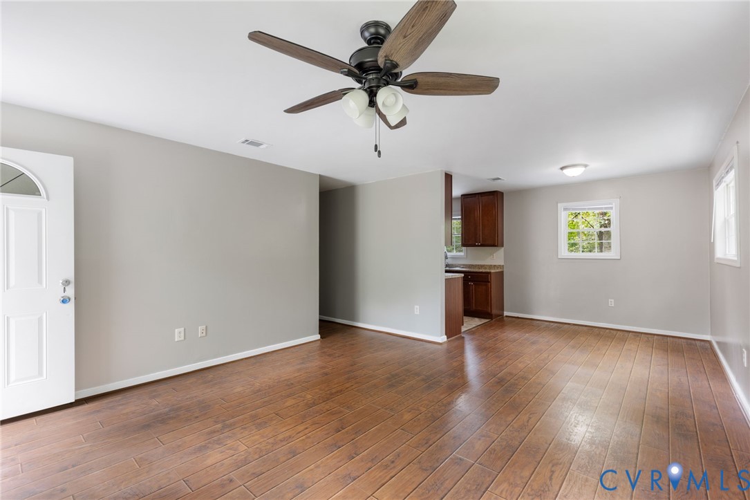 164 Kinneytown Road Mineral, VA 23117 - Photo 5 of 31 a view of empty room with wooden floor and ceiling fan