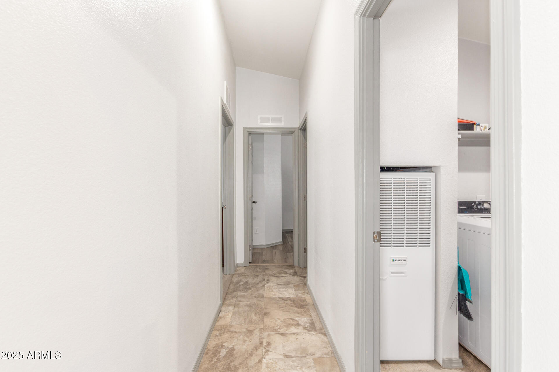 11425 East University Drive, Unit 115 Apache Junction, AZ 85120 - Photo 9 of 28 a view of a hallway with wooden floor