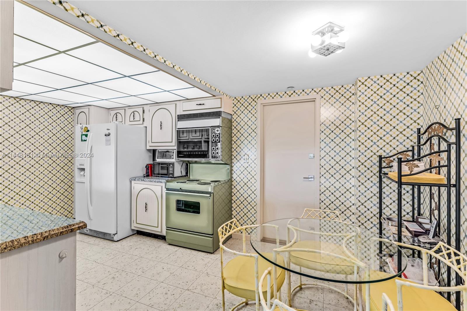 199 Ocean Ln Drive, Unit 212 Key Biscayne, FL 33149 - Photo 14 of 44 a bathroom with a sink a mirror and a shower