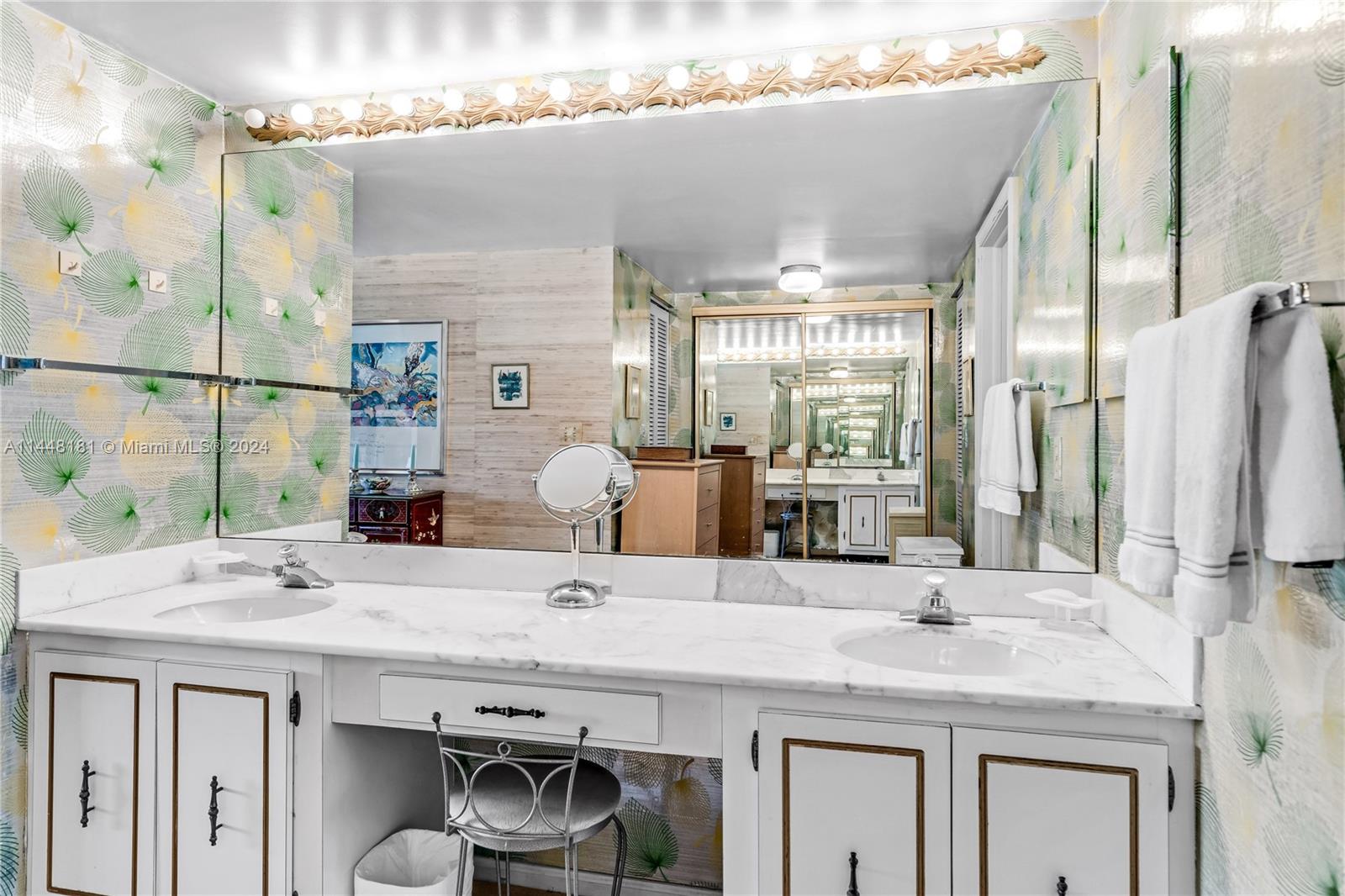 199 Ocean Ln Drive, Unit 212 Key Biscayne, FL 33149 - Photo 19 of 44 a bathroom with a sink and a mirror