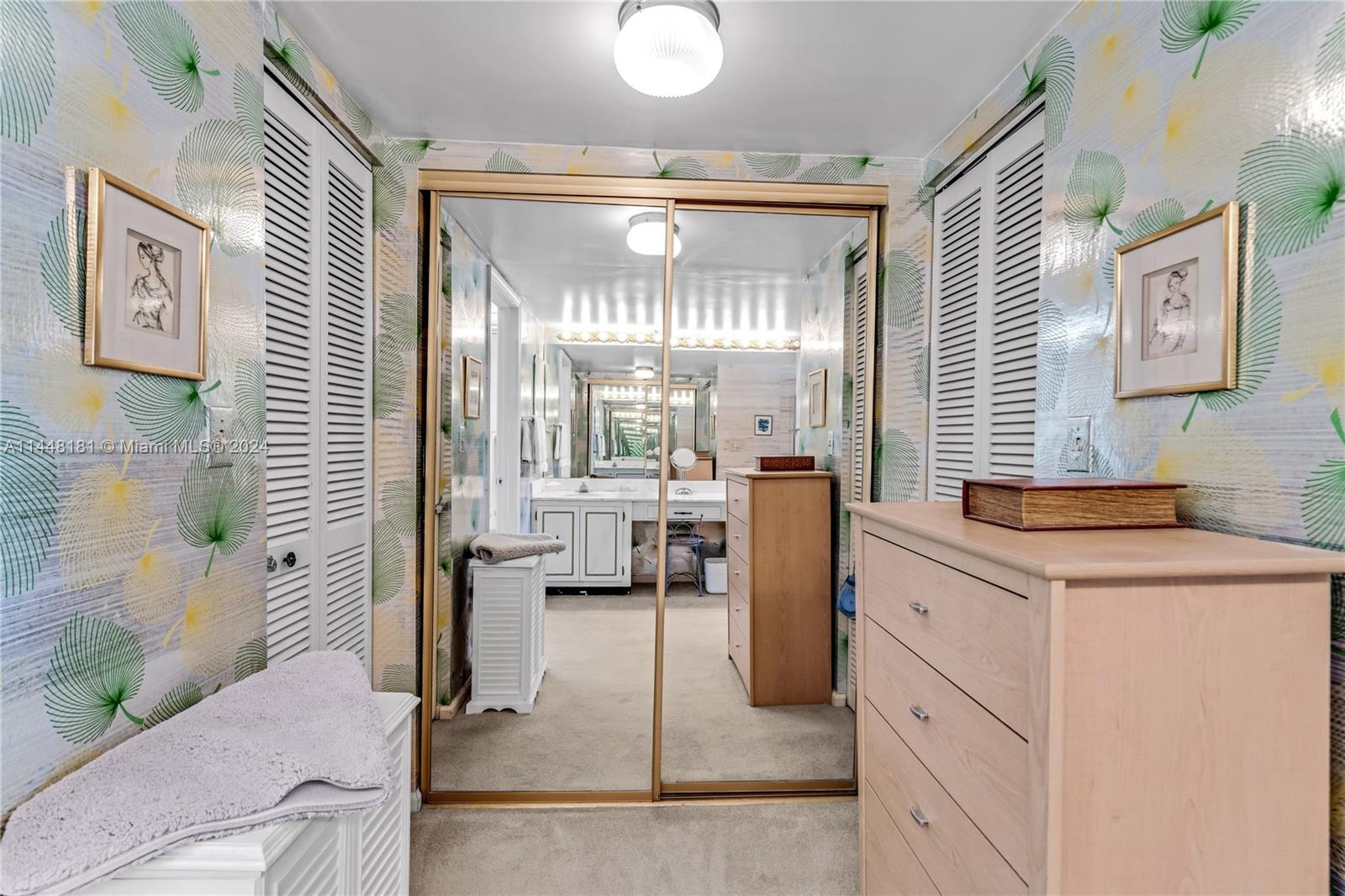 199 Ocean Ln Drive, Unit 212 Key Biscayne, FL 33149 - Photo 20 of 44 a kitchen with a refrigerator and countertop