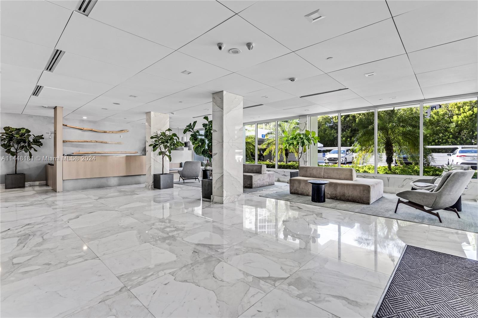 199 Ocean Ln Drive, Unit 212 Key Biscayne, FL 33149 - Photo 26 of 44 a living room with furniture and a large window