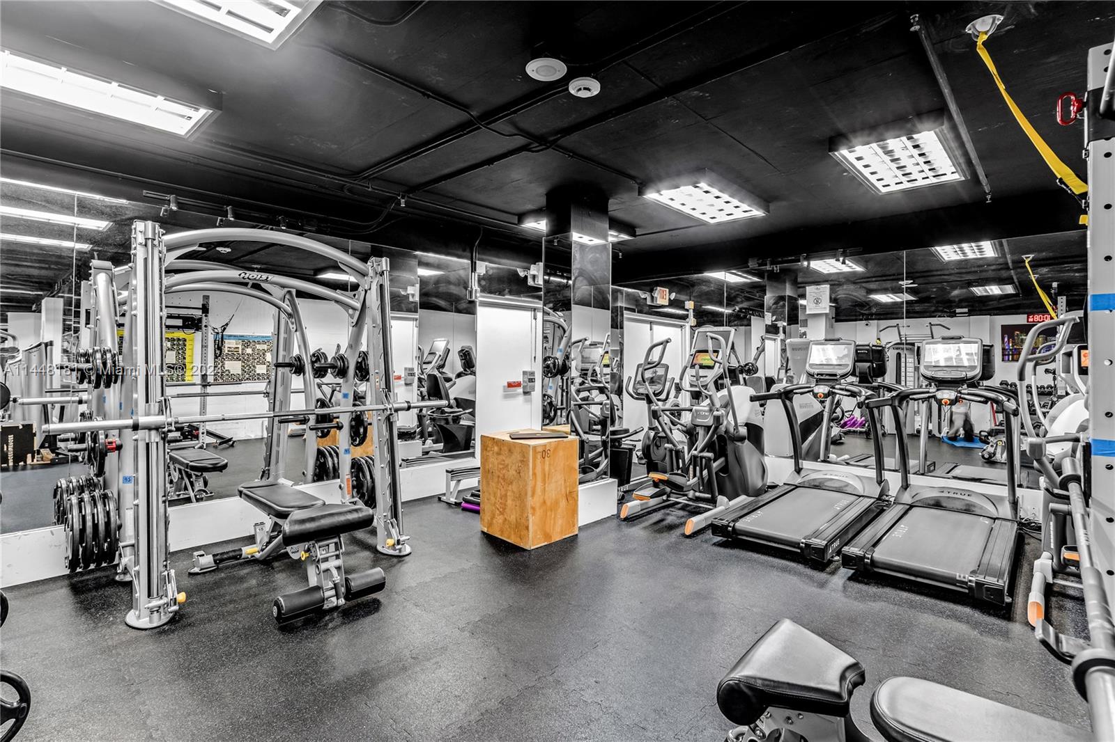 199 Ocean Ln Drive, Unit 212 Key Biscayne, FL 33149 - Photo 27 of 44 a view of a room with gym equipment