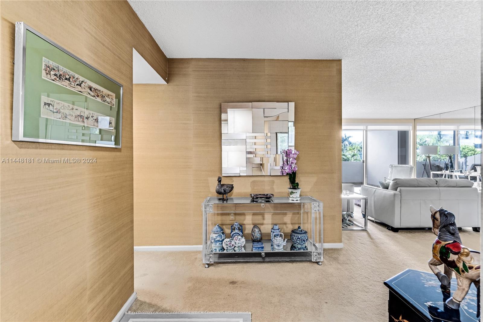 199 Ocean Ln Drive, Unit 212 Key Biscayne, FL 33149 - Photo 5 of 44 a living room with furniture and a table