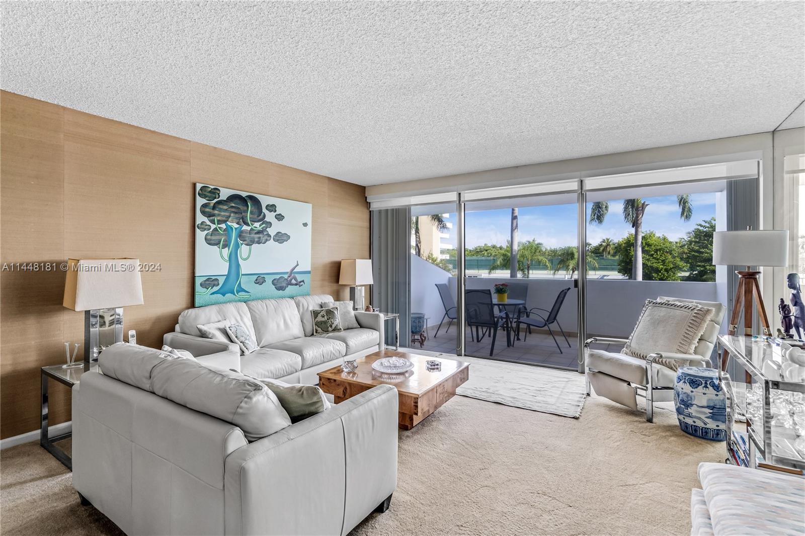 199 Ocean Ln Drive, Unit 212 Key Biscayne, FL 33149 - Photo 9 of 44 a living room with furniture and a large window