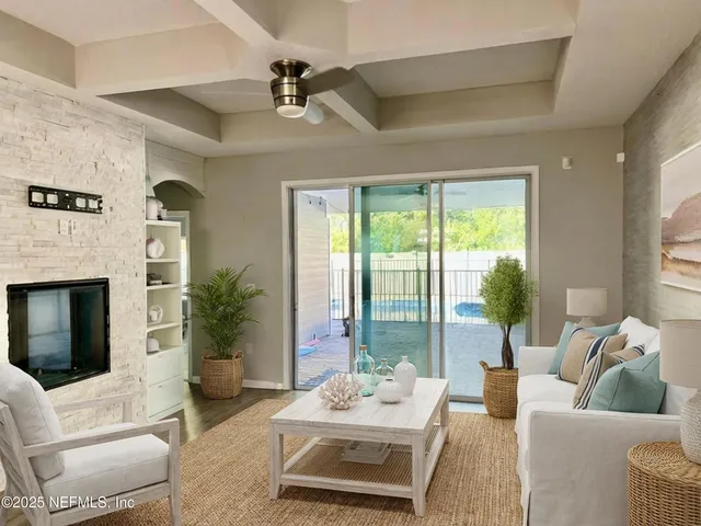 a bathroom with a sink a toilet a mirror and shower curtain