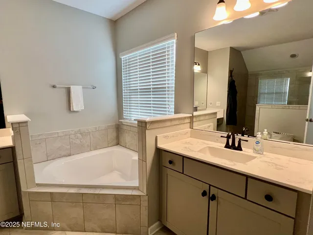 a view of a balcony with a swimming pool