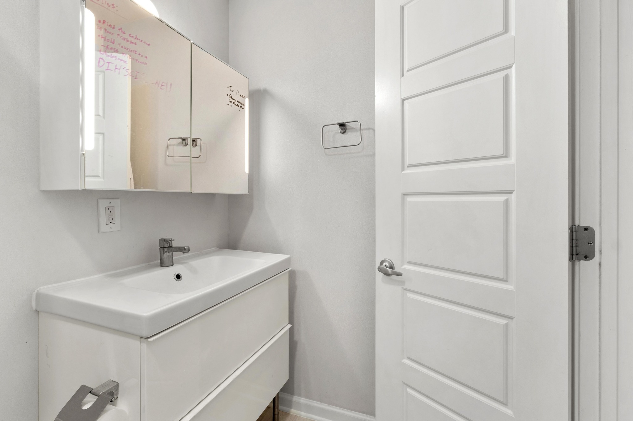 2404 Longview Street, Unit 105 Austin, TX 78705 - Photo 9 of 21 a utility room with cabinets washer and dryer