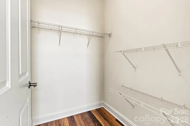 a view of a room with racks on the wall