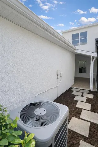 a kitchen with a table and chairs in it
