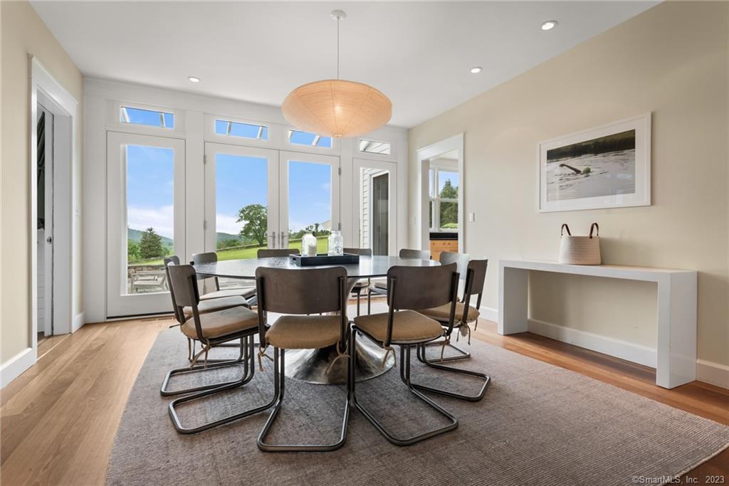 141 Geer Mountain Road South Kent, CT 06785 - Photo 11 of 33 a dining room with furniture and window
