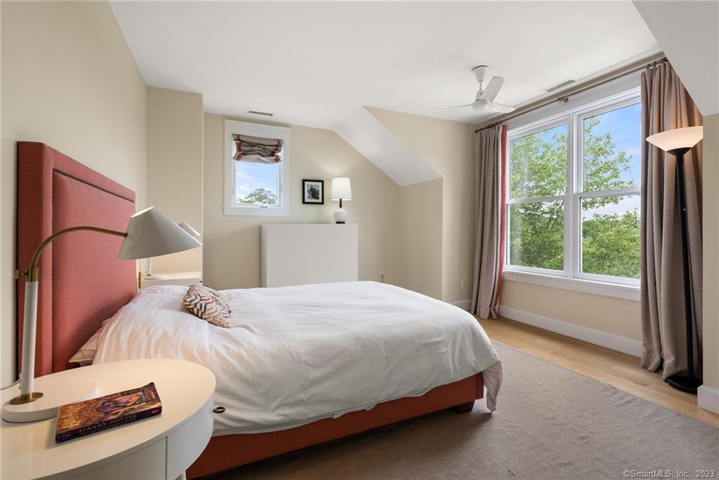 141 Geer Mountain Road South Kent, CT 06785 - Photo 16 of 33 a bedroom with a bed and a window