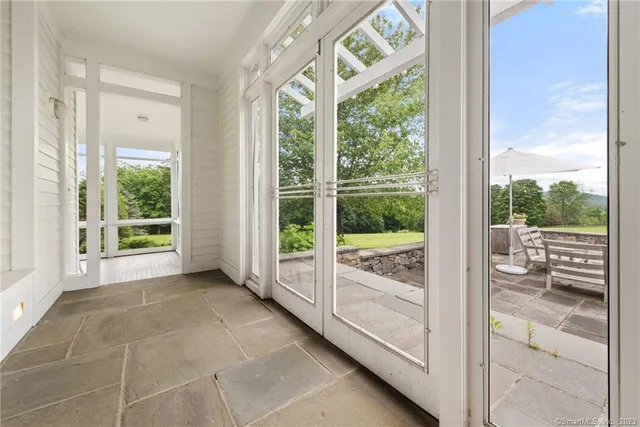 a view of an empty room and window
