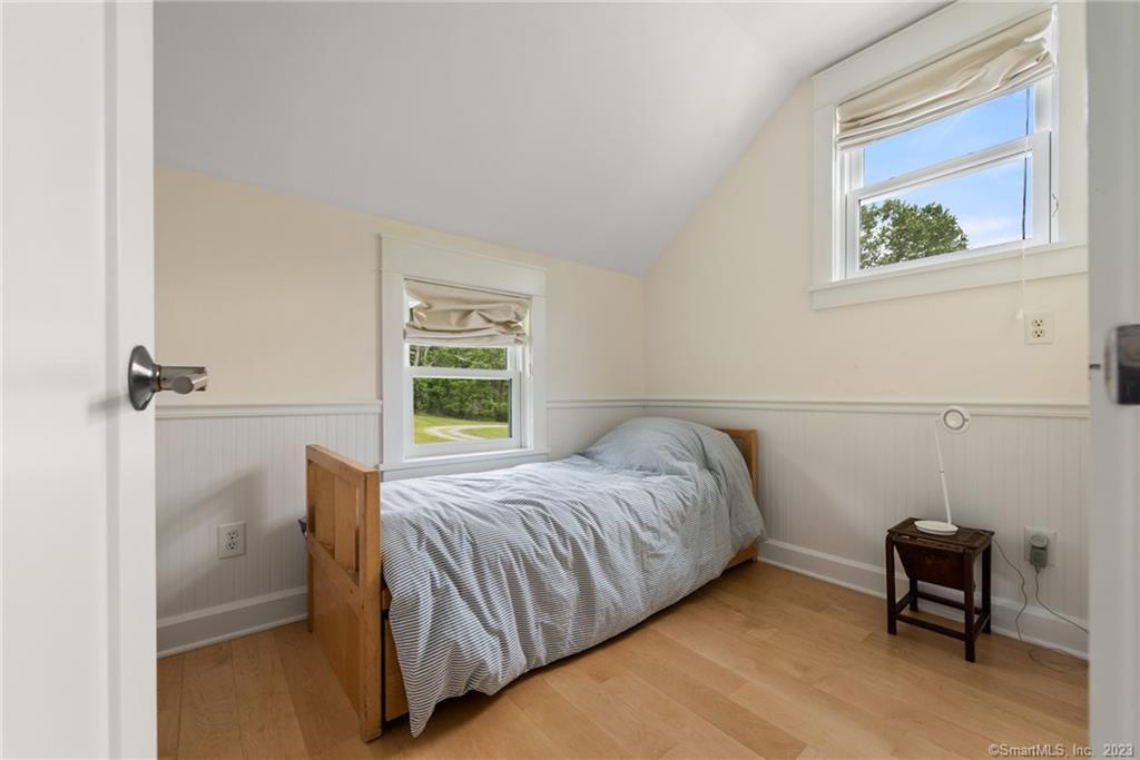 141 Geer Mountain Road South Kent, CT 06785 - Photo 30 of 33 a bedroom with a bed and a window