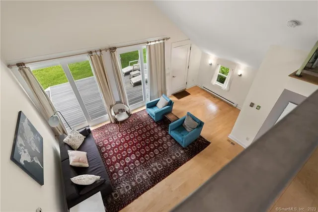 a living room with furniture and a table