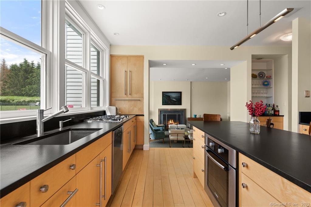 141 Geer Mountain Road South Kent, CT 06785 - Photo 8 of 33 a kitchen with sink stove and refrigerator