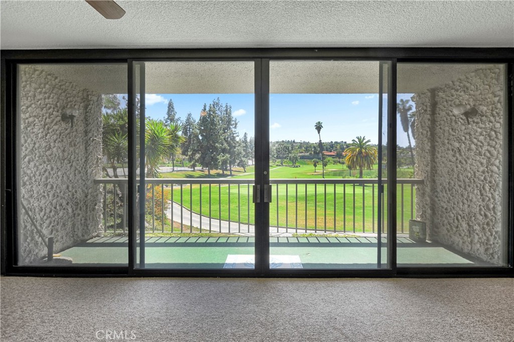 5555 Canyon Crest Drive, Unit 1F Riverside, CA 92507 - Photo 17 of 27 a view of front door