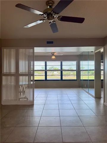 a view of a lake with a yard