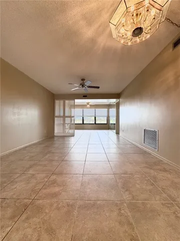 a view of a livingroom with a staircase