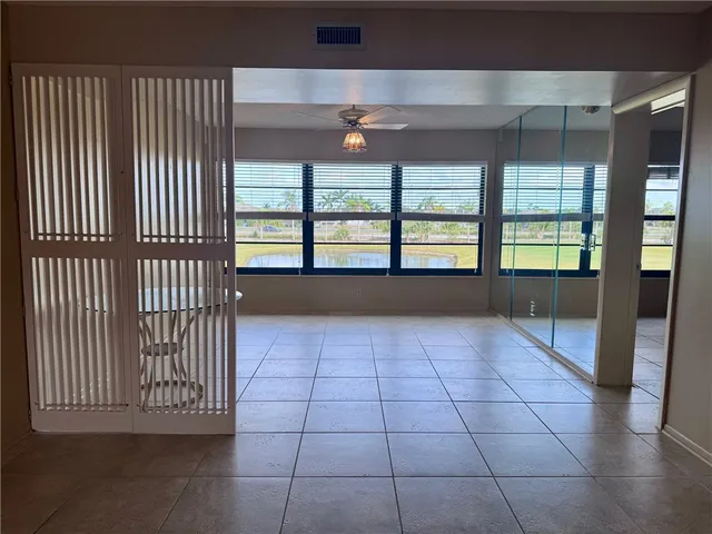 a view of hallway with windows