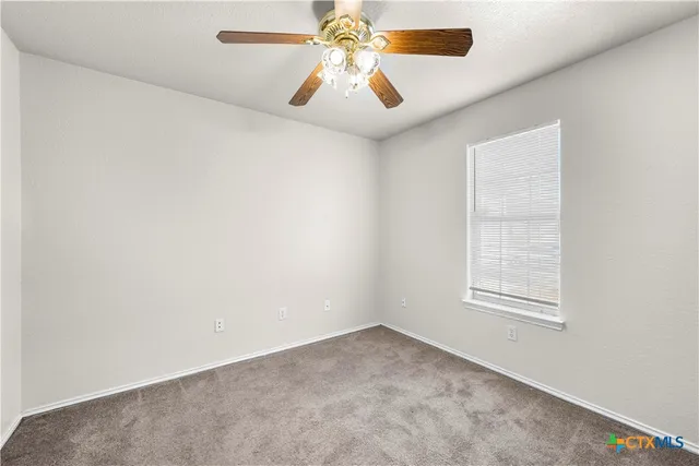 a view of a backyard of the house