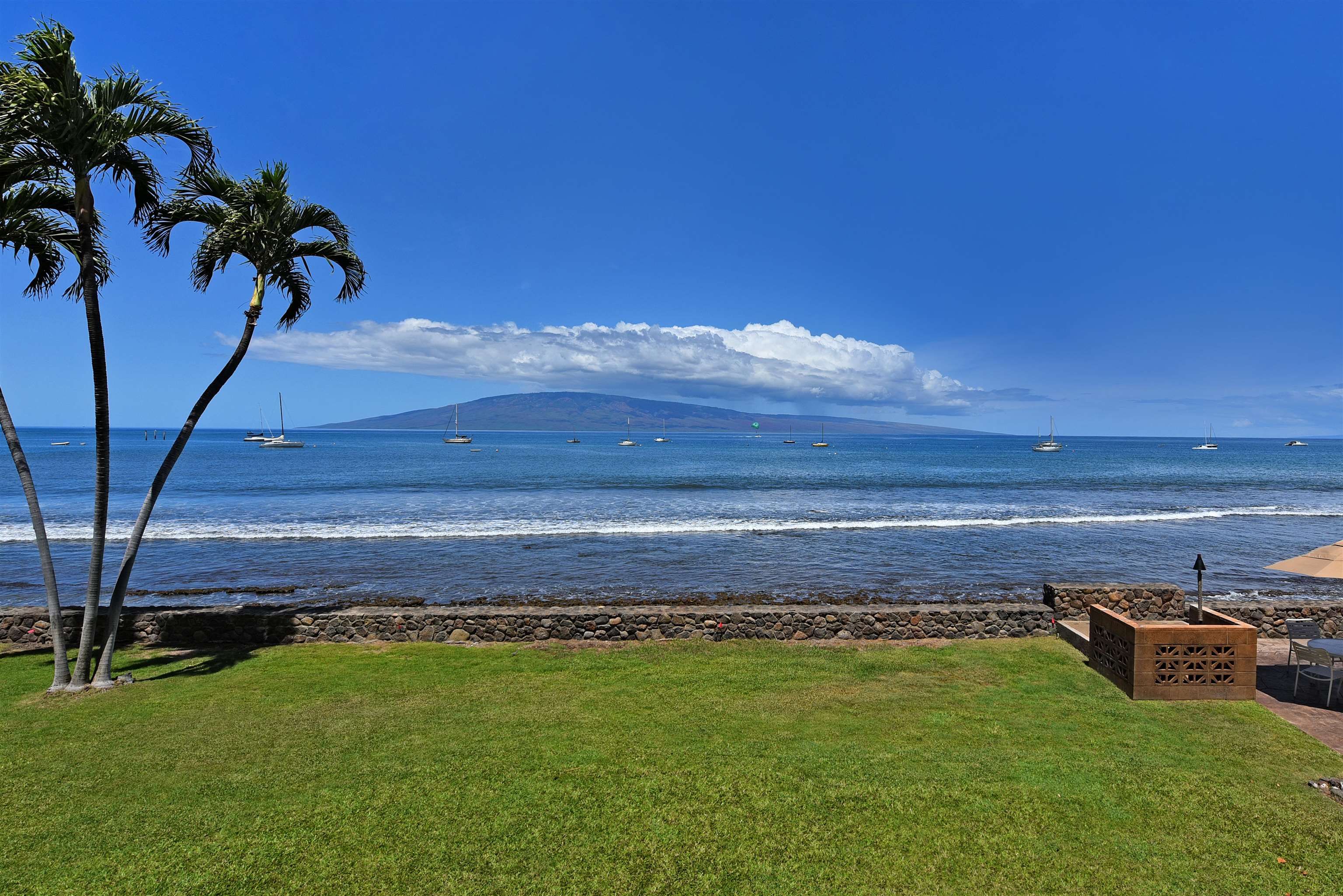 1403 Front Street, Unit 308 Lahaina, HI 96761 - Photo 22 of 35 a view of a yard with an outdoor space
