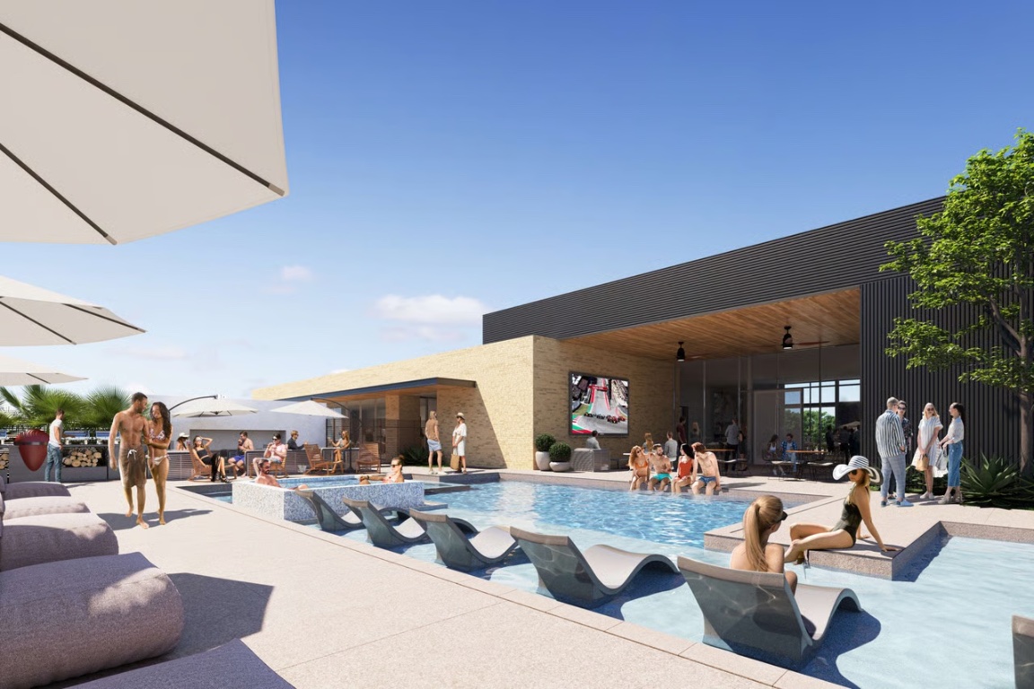 8001 Circuit Of The Americas Boulevard, Unit 502 Del Valle, TX 78617 - Photo 2 of 18 a view of a living room with furniture and a potted plant