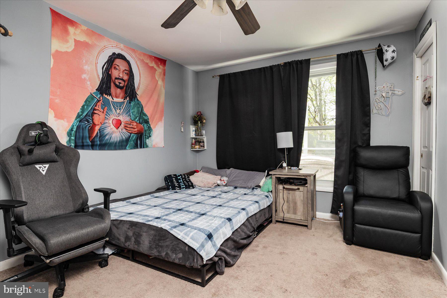 4904 Beech Street Shady Side, MD 20764 - Photo 15 of 26 a bedroom with a bed and furniture