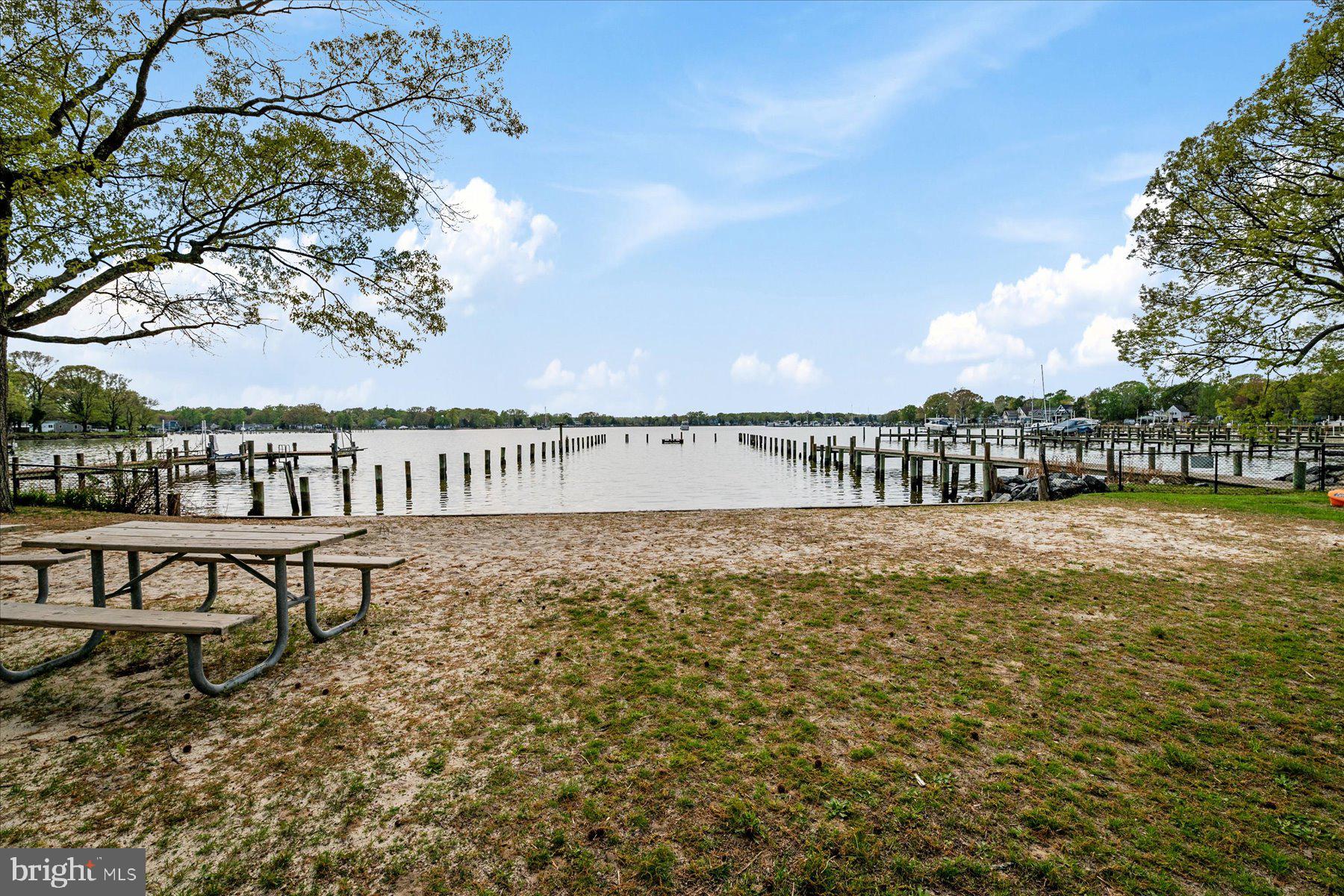 4904 Beech Street Shady Side, MD 20764 - Photo 23 of 26 a view of outdoor space with garden and deck