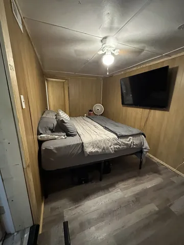 a bathroom with a sink a mirror and a shower